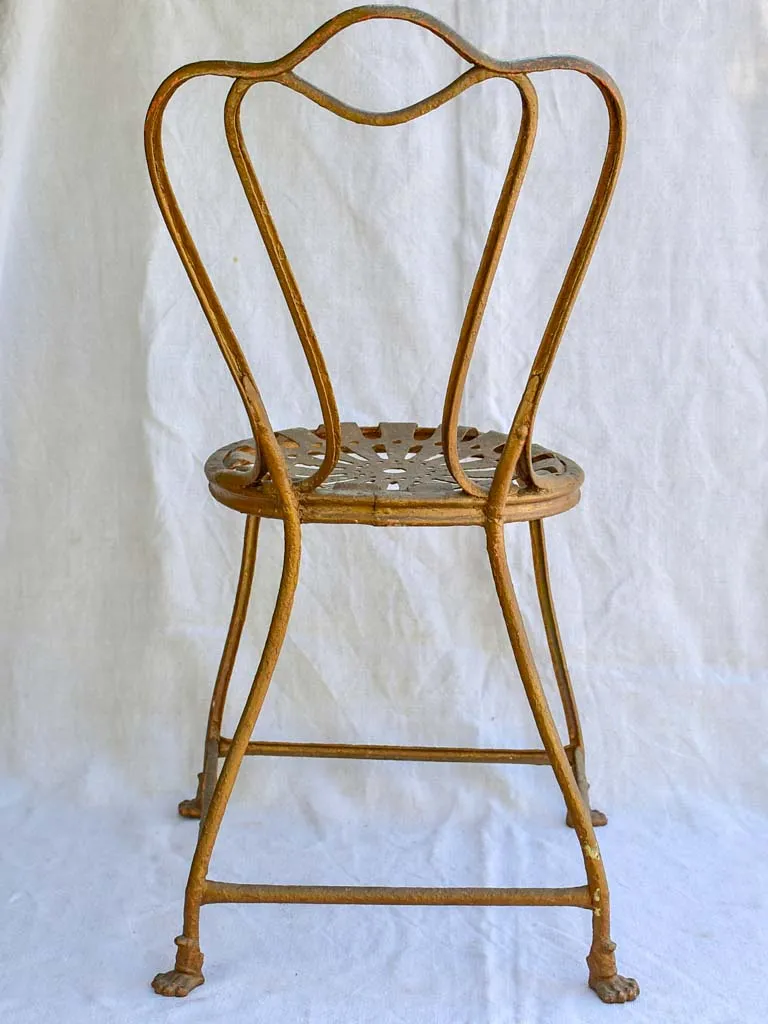 19th century French iron garden chair from Arras with lions claw feet