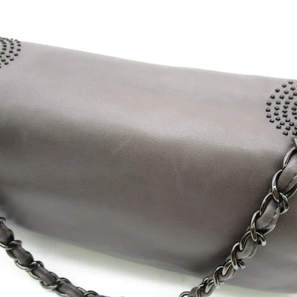 Chanel CC Studded Eat West Full Flap Bag Leather Crossbody Bag in Excellent condition