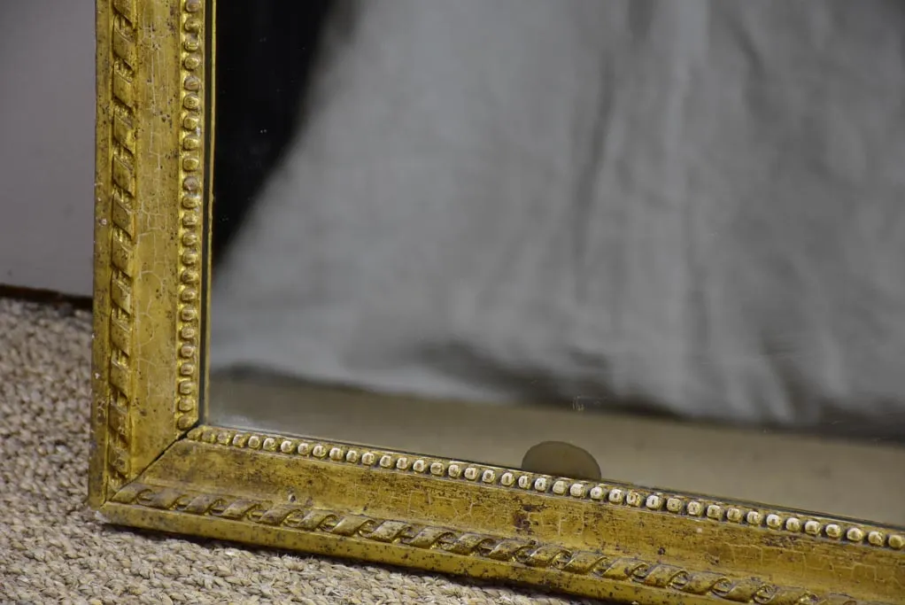 Early 19th Century French mirror with fatigued gold frame