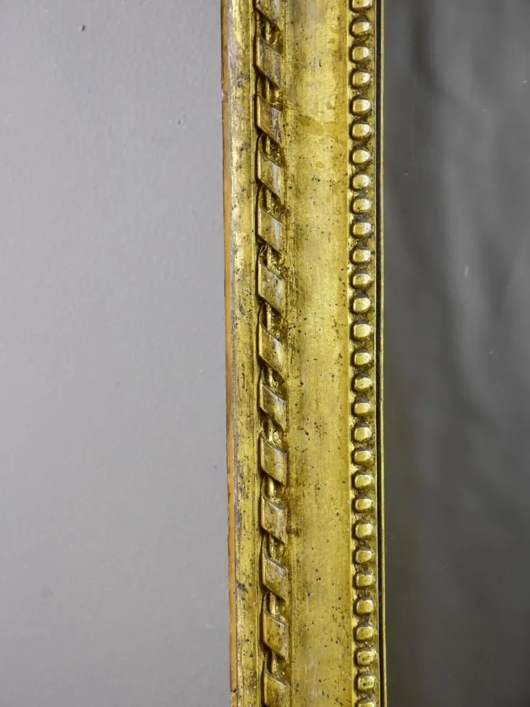 Early 19th Century French mirror with fatigued gold frame