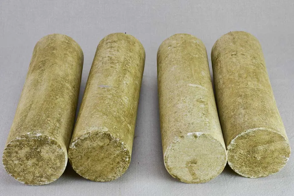Four large stone candlesticks 16½"