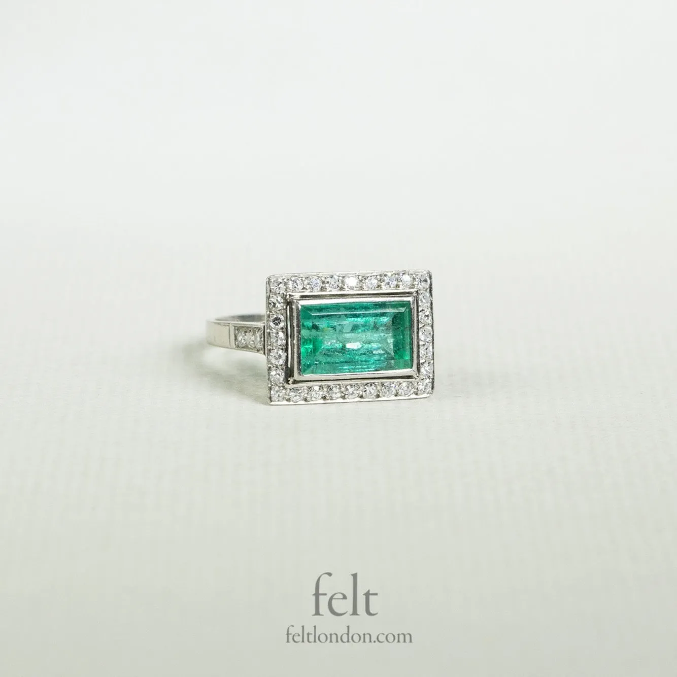 Platinum, Diamond and Emerald Rectangular Antique Ring.