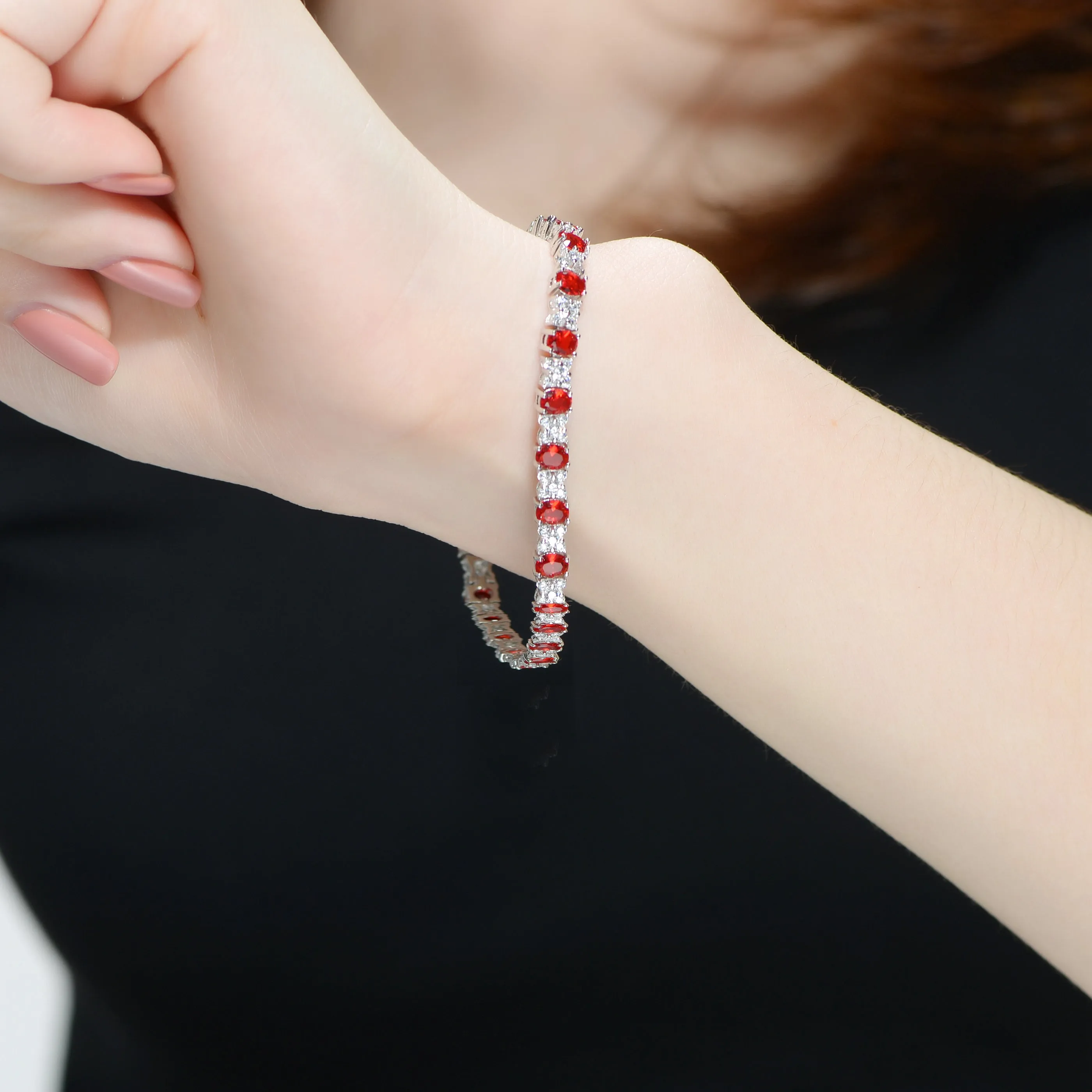 Sterling Silver Bracelet Adorned with Gemstones